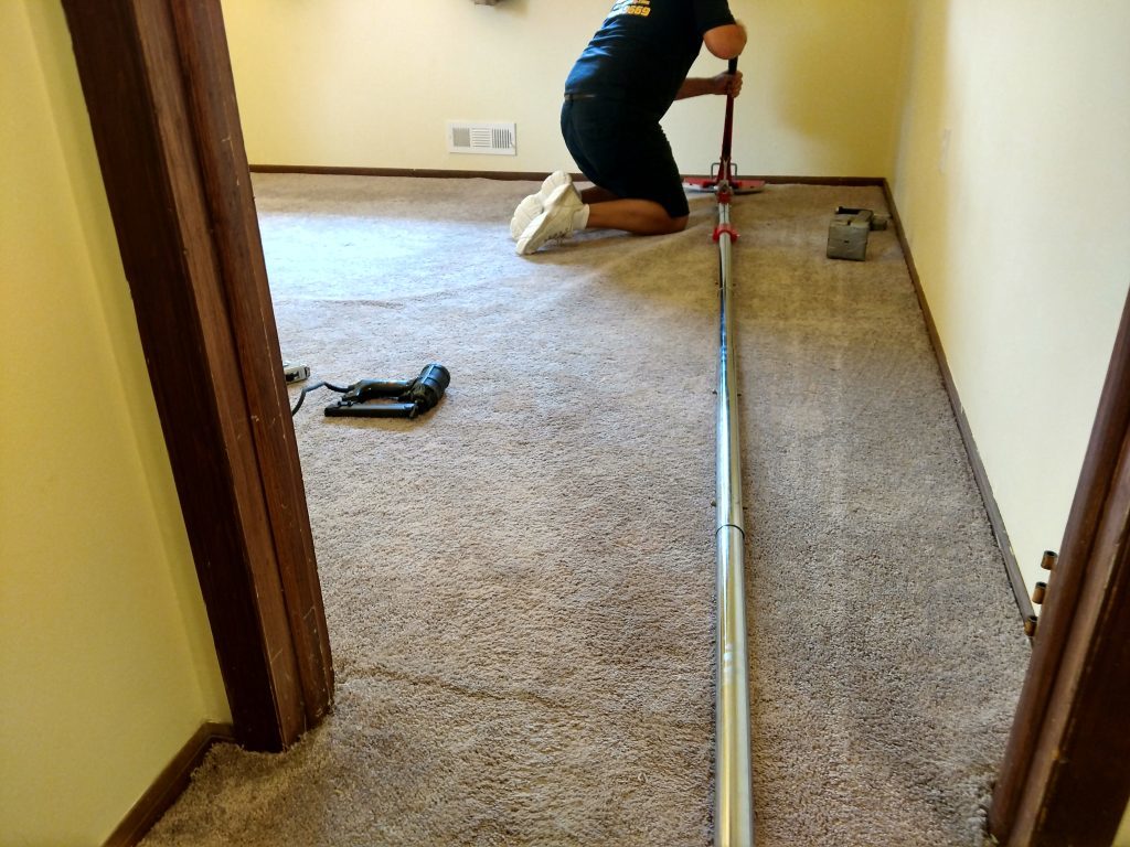 Carpet Stretching and Removing Carpet Ripples and Bumps
