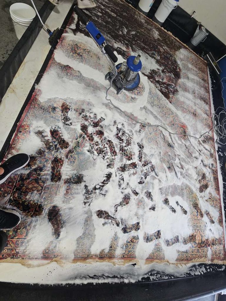 Area rug being shampooed at GM Carpet Care's in-plant rug cleaning facility in Toms River, NJ